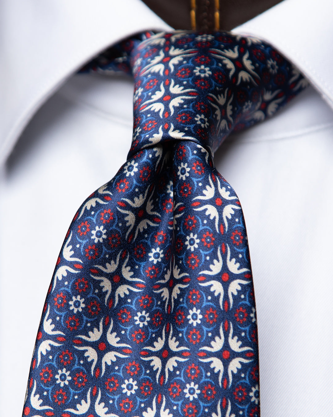 Blue Tie with Heraldic Arabesque and Ruby Accents