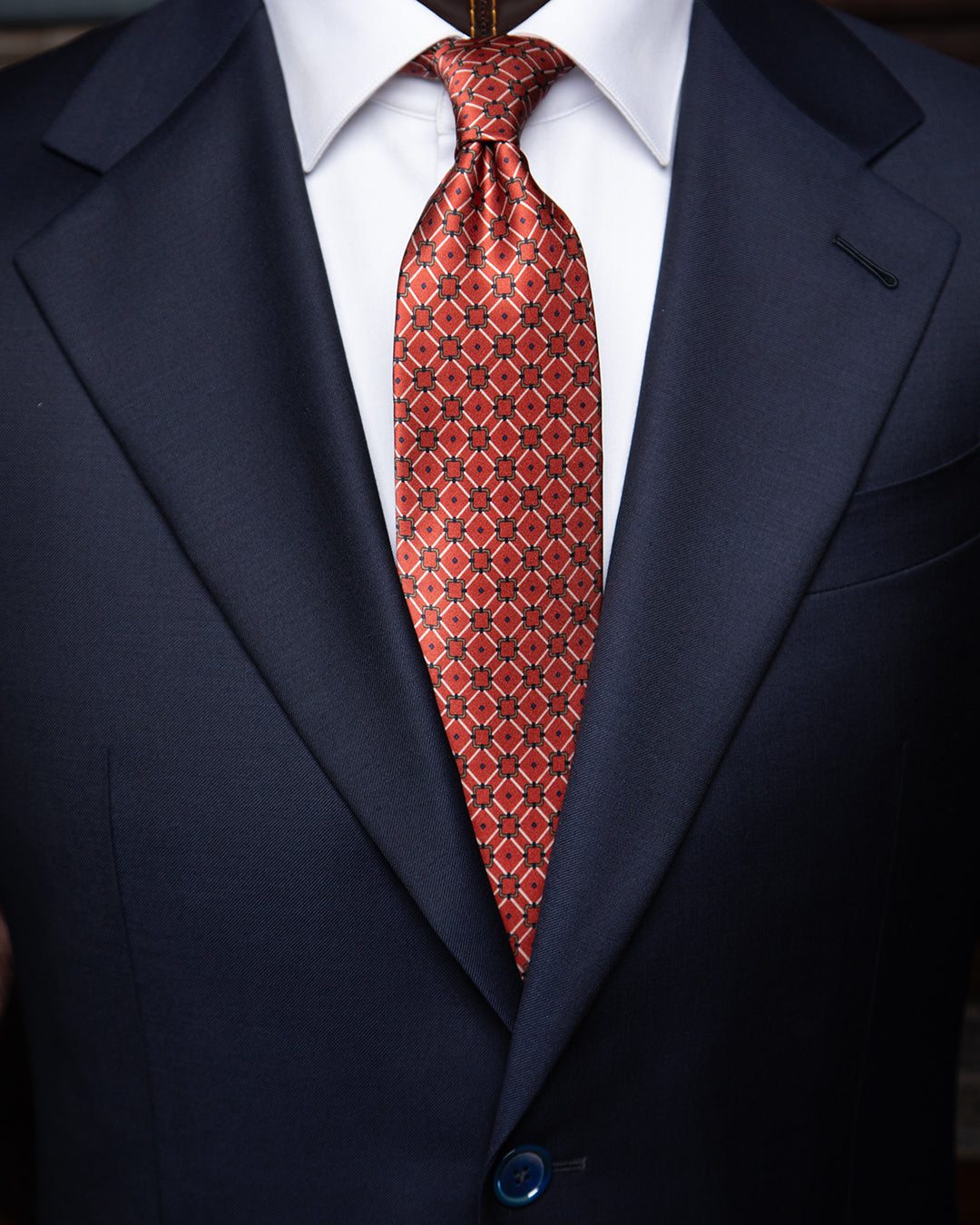Cravatta Rosso Terracotta e Blu con Graticciata Geometrica