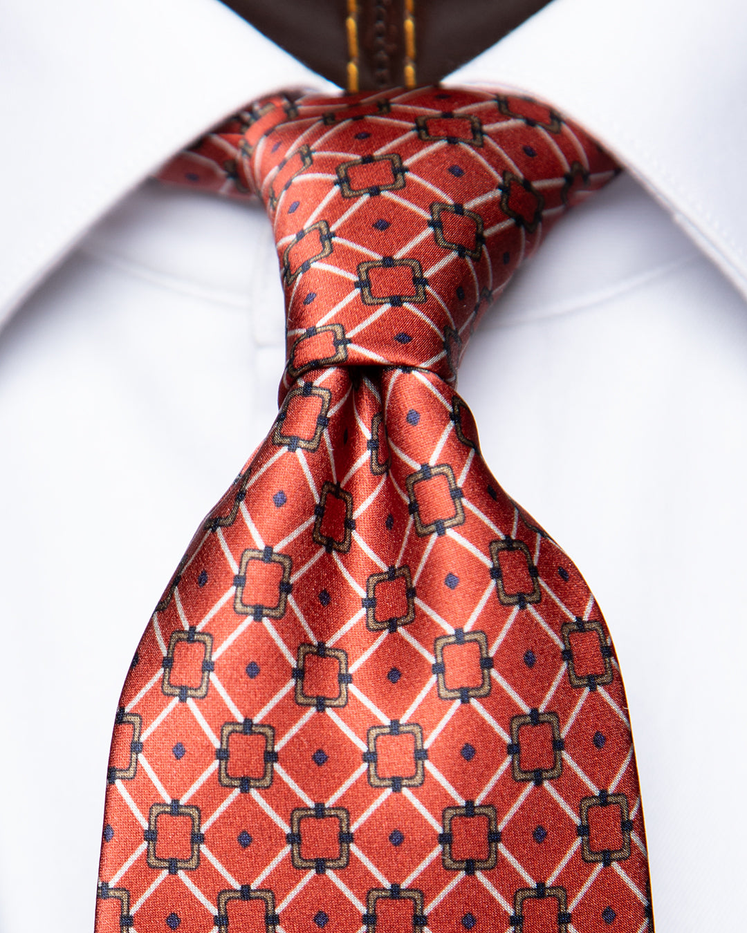 Cravatta Rosso Terracotta e Blu con Graticciata Geometrica