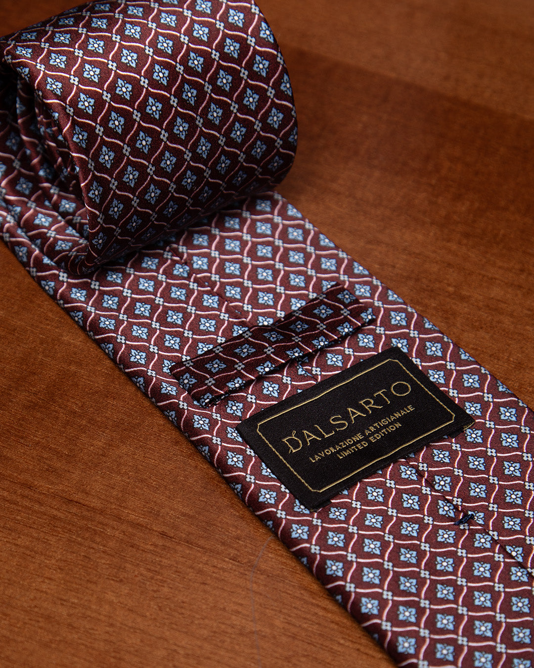 Plum Tie with Geometric Lattice and Light Blue Micro-Rosette