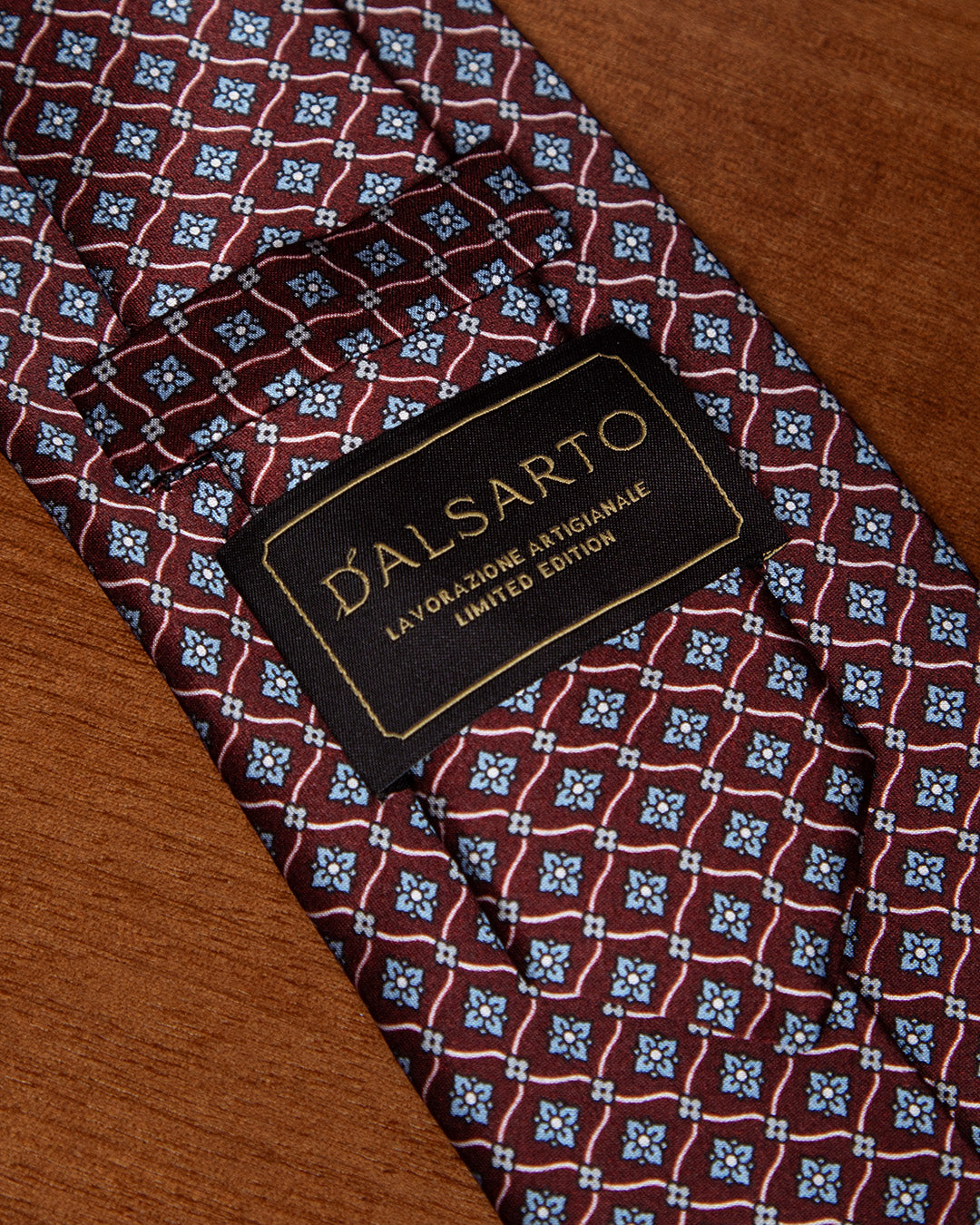 Plum Tie with Geometric Lattice and Light Blue Micro-Rosette