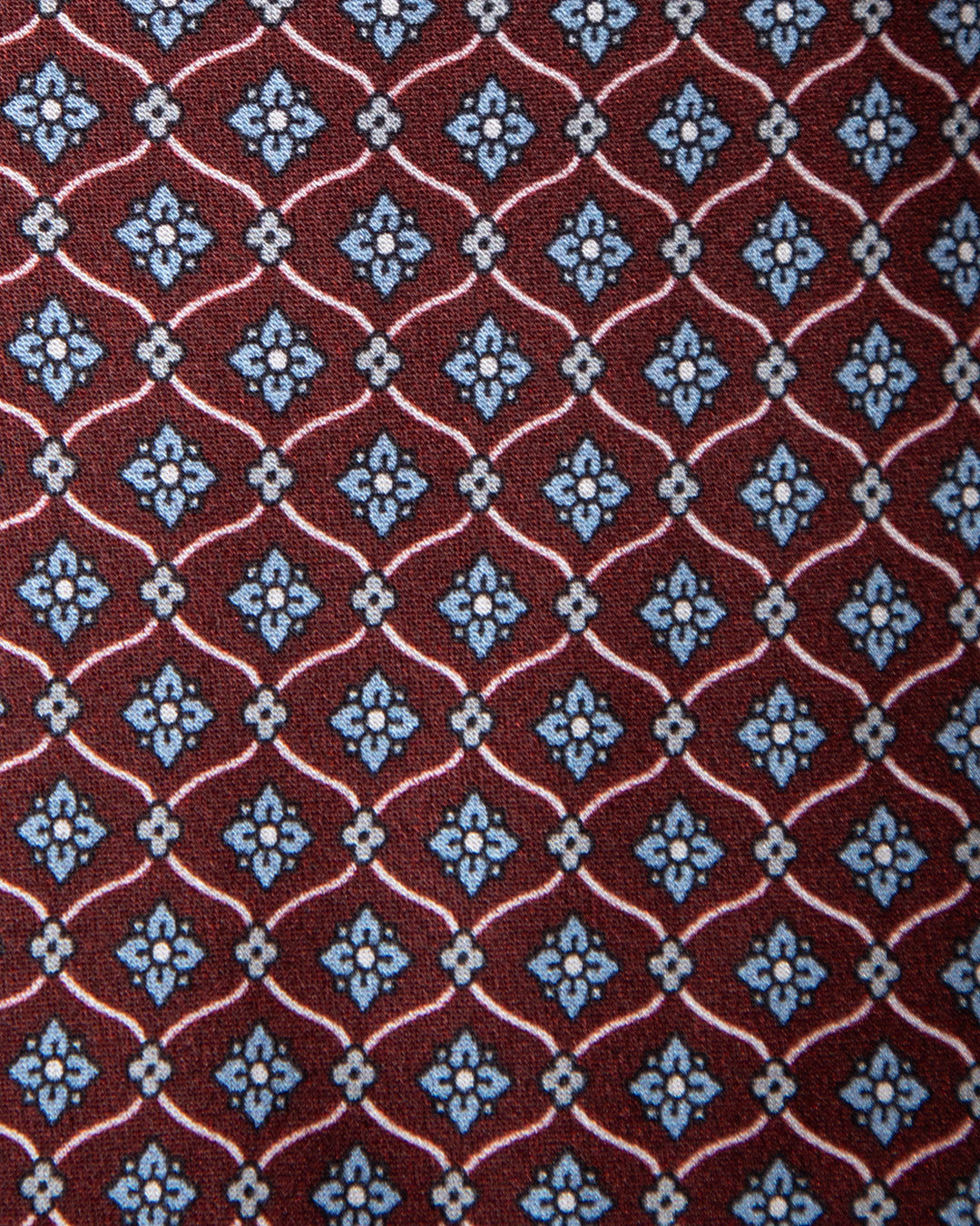 Plum Tie with Geometric Lattice and Light Blue Micro-Rosette