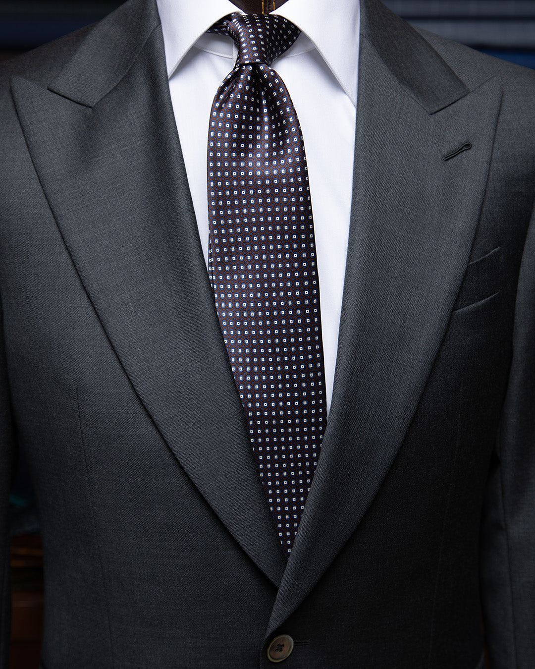 Brown and Blue Tie with Geometric Lattice Pattern