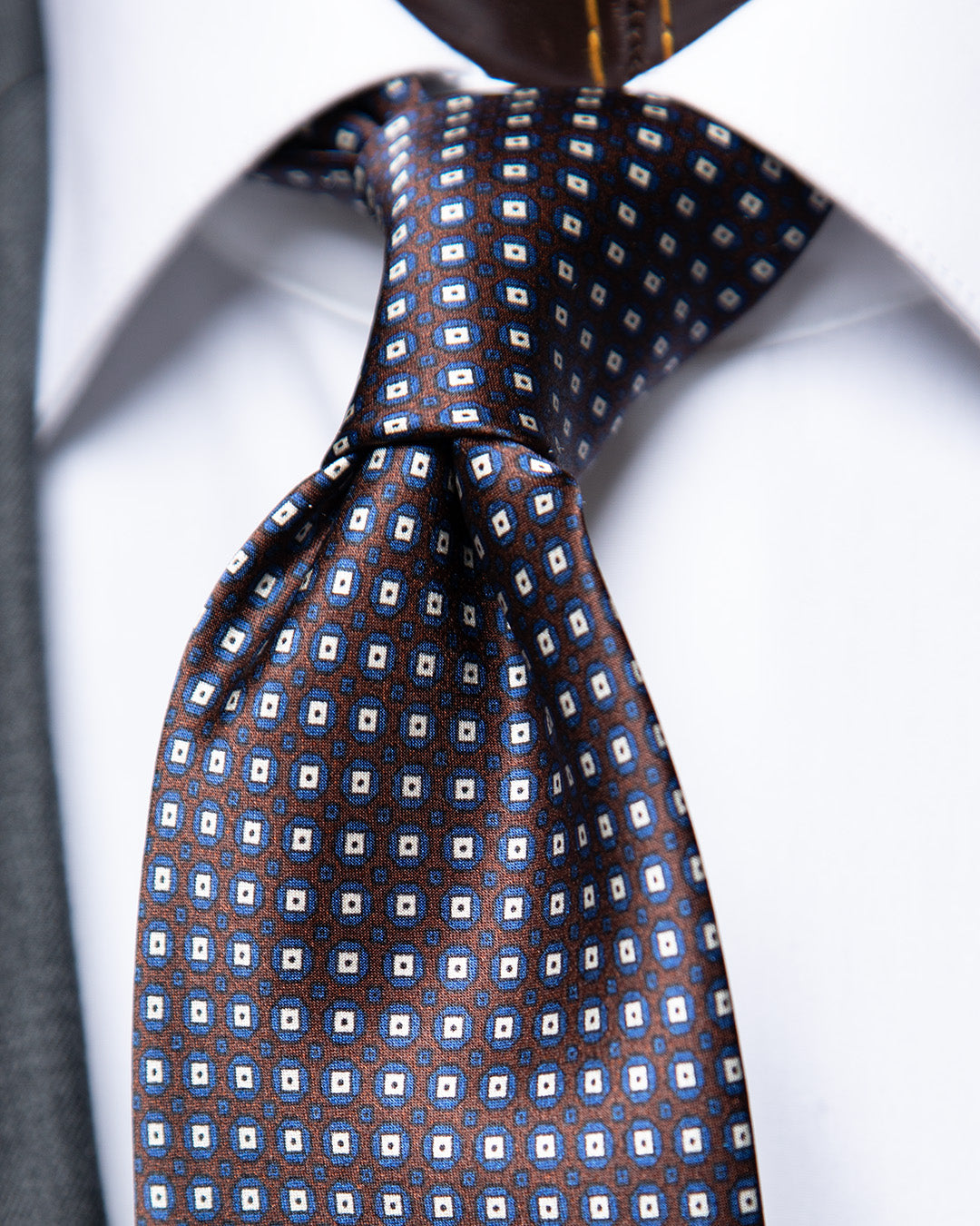 Brown and Blue Tie with Geometric Lattice Pattern