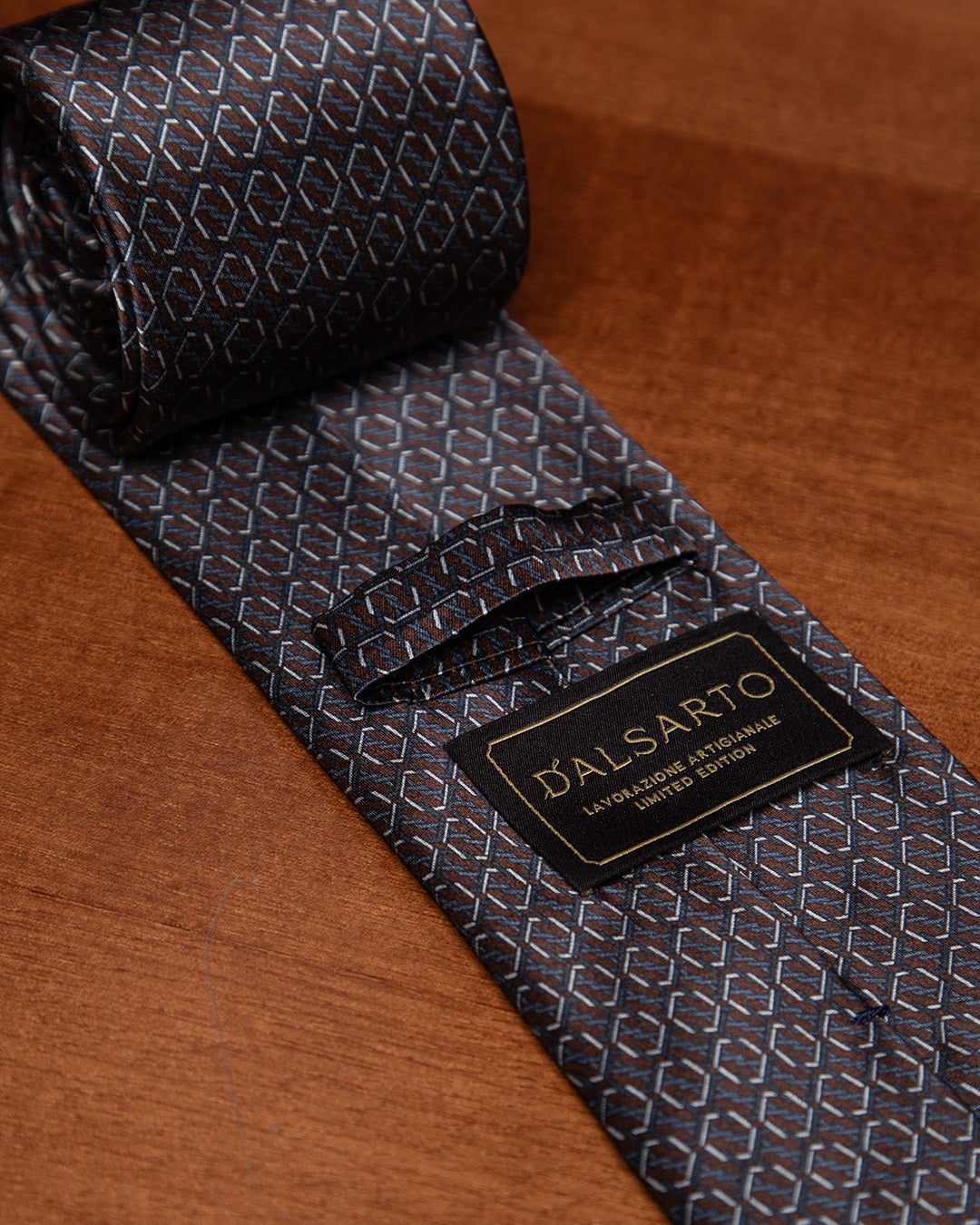 Brown and Blue Tie with Hexagonal Ring Geometry