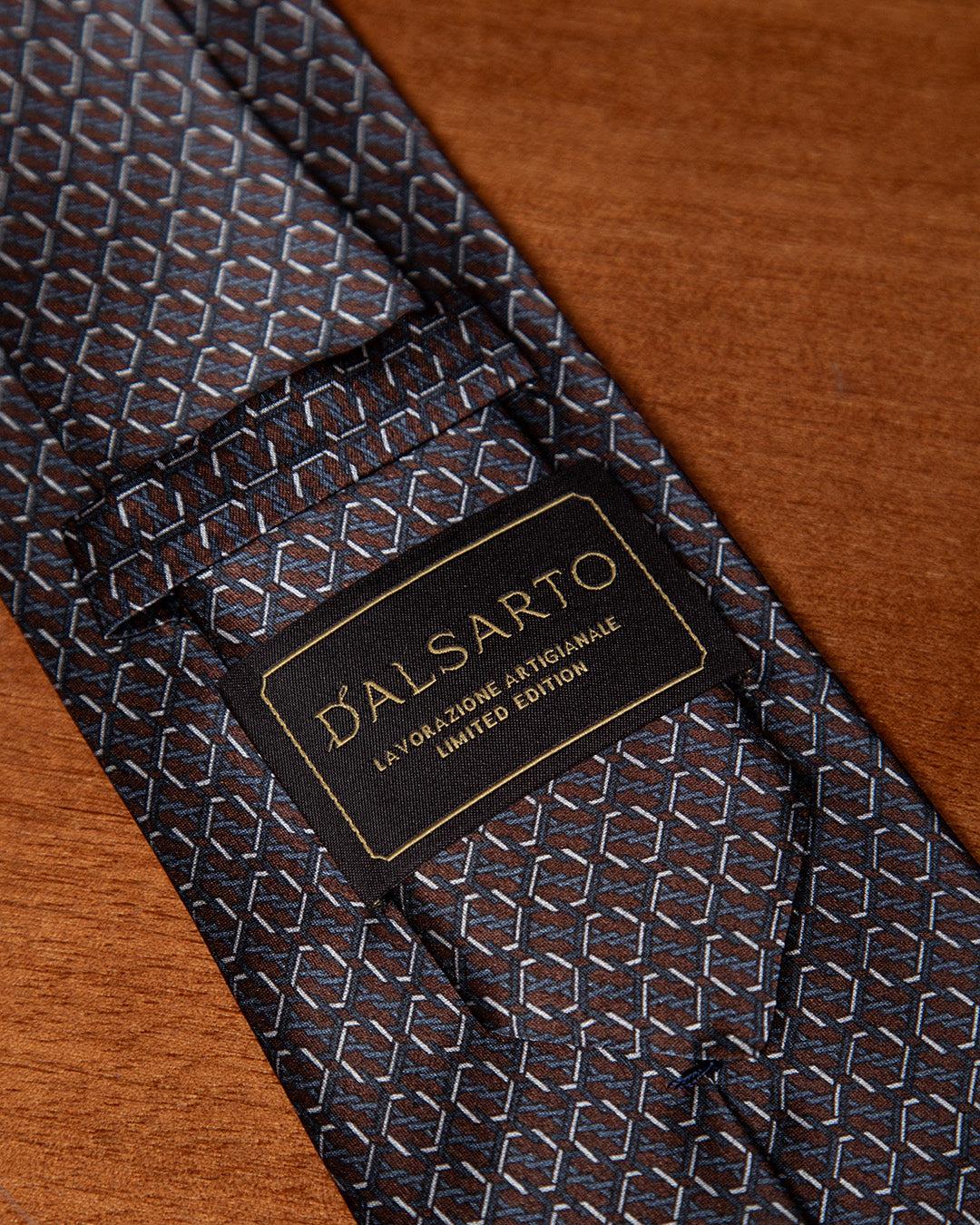 Brown and Blue Tie with Hexagonal Ring Geometry