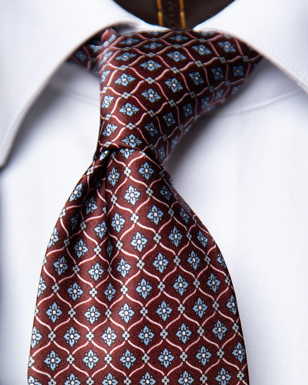 Plum Tie with Geometric Lattice and Light Blue Micro-Rosette