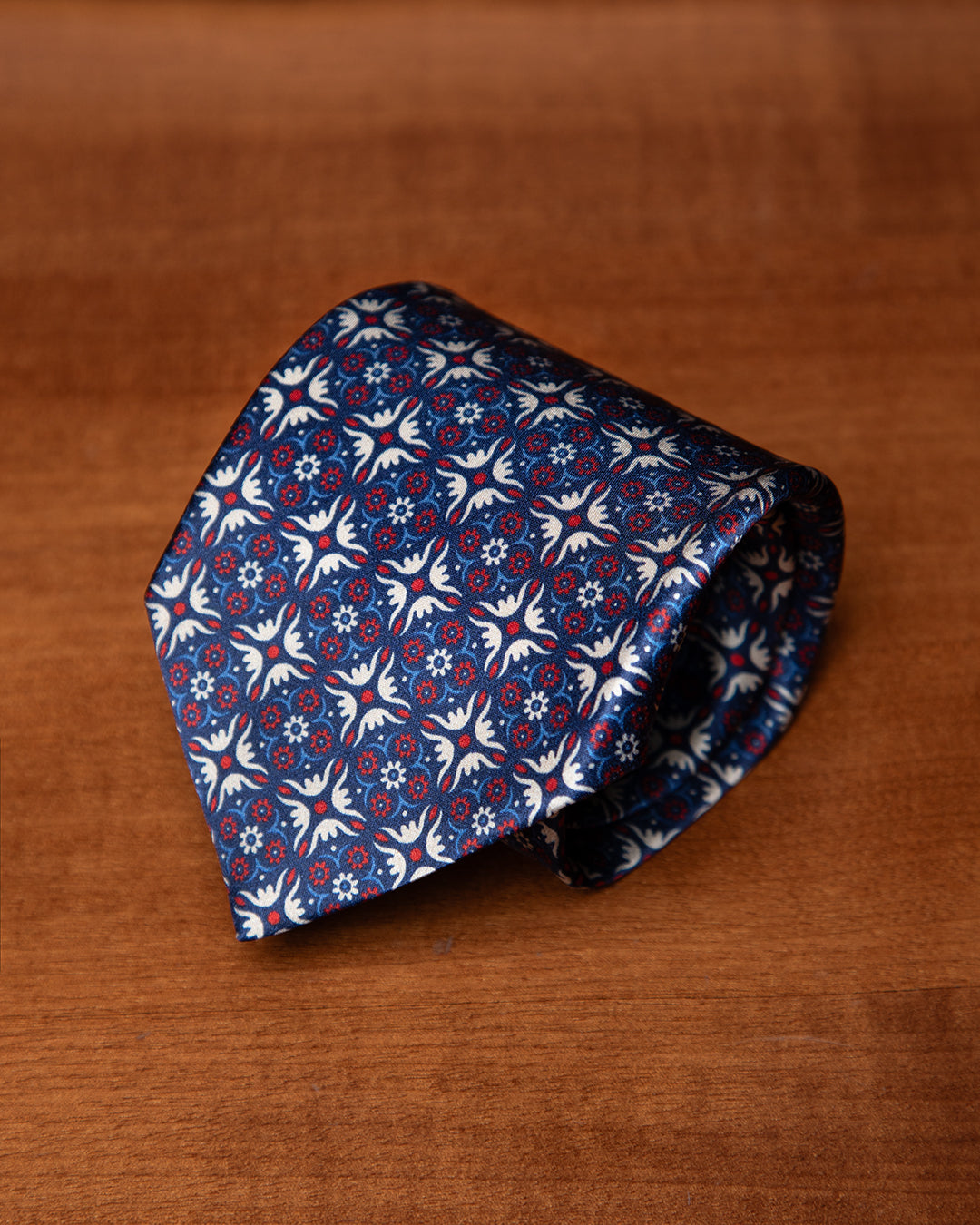 Blue Tie with Heraldic Arabesque and Ruby Accents