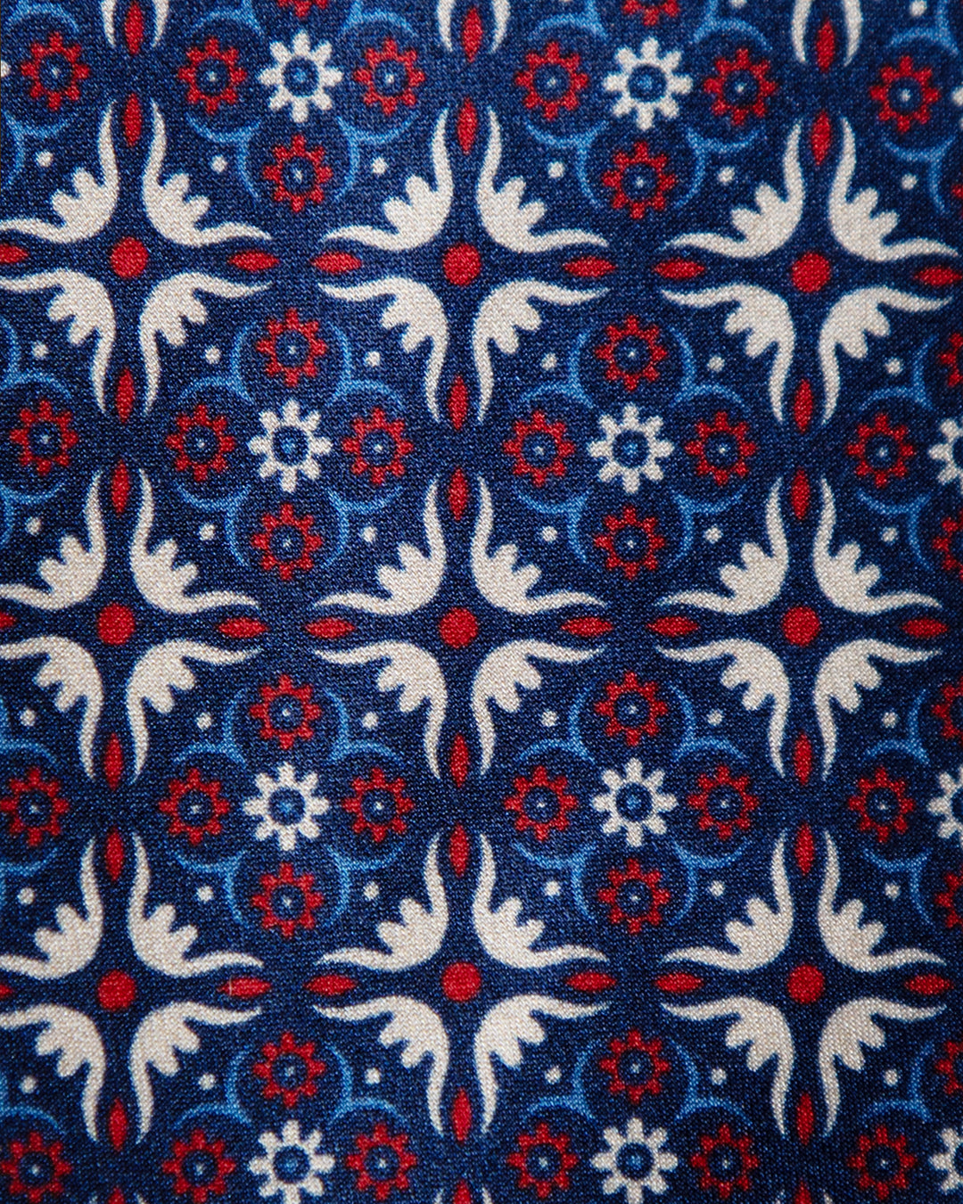 Blue Tie with Heraldic Arabesque and Ruby Accents