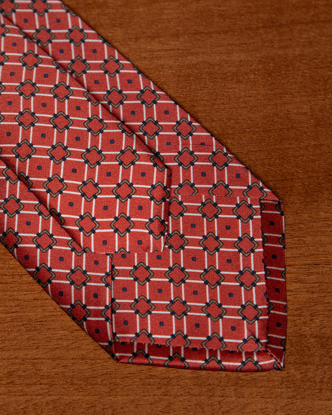 Cravatta Rosso Terracotta e Blu con Graticciata Geometrica