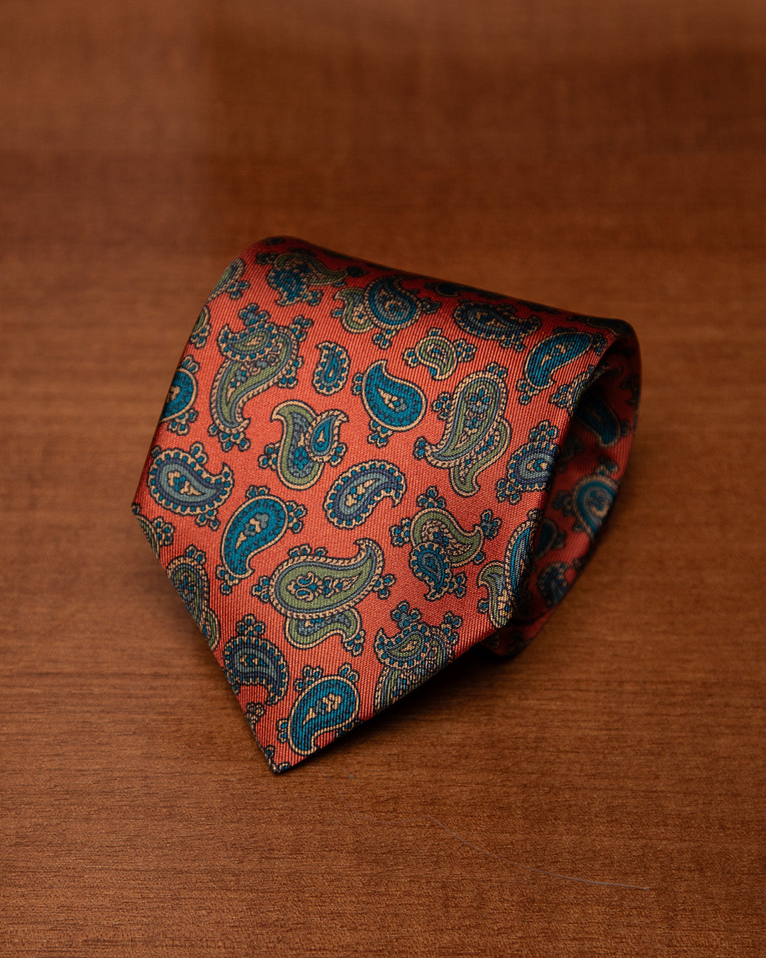 Orange Tie with Light Blue and Sage Paisley Pattern