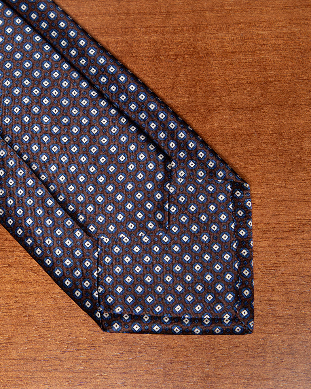 Brown and Blue Tie with Geometric Lattice Pattern