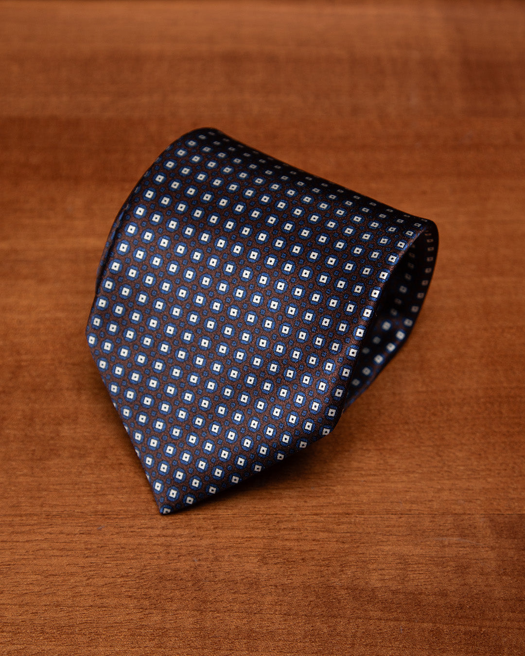 Brown and Blue Tie with Geometric Lattice Pattern