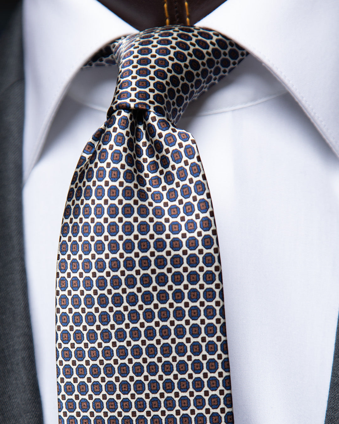 Cream and Blue Tie with Geometric Lattice Pattern
