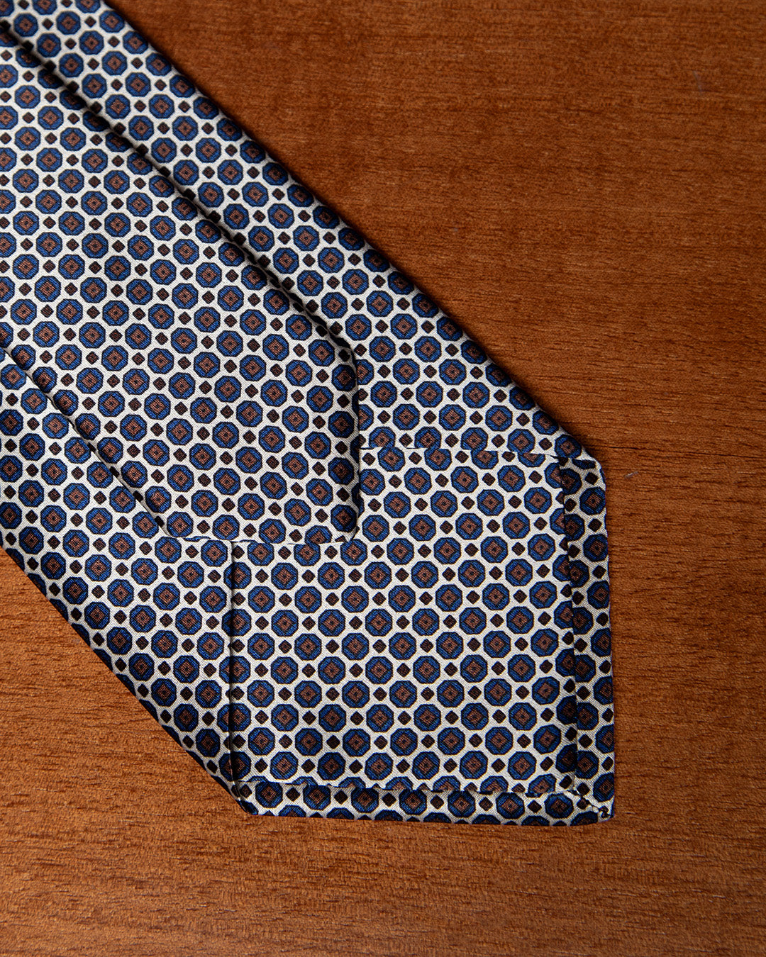 Cream and Blue Tie with Geometric Lattice Pattern